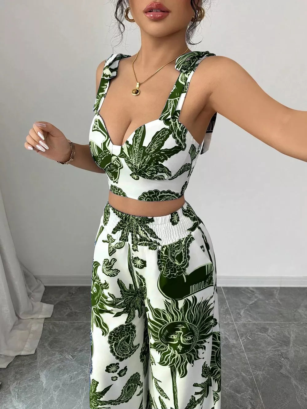 Green tropical print crop top and wide-leg pants set with tie straps