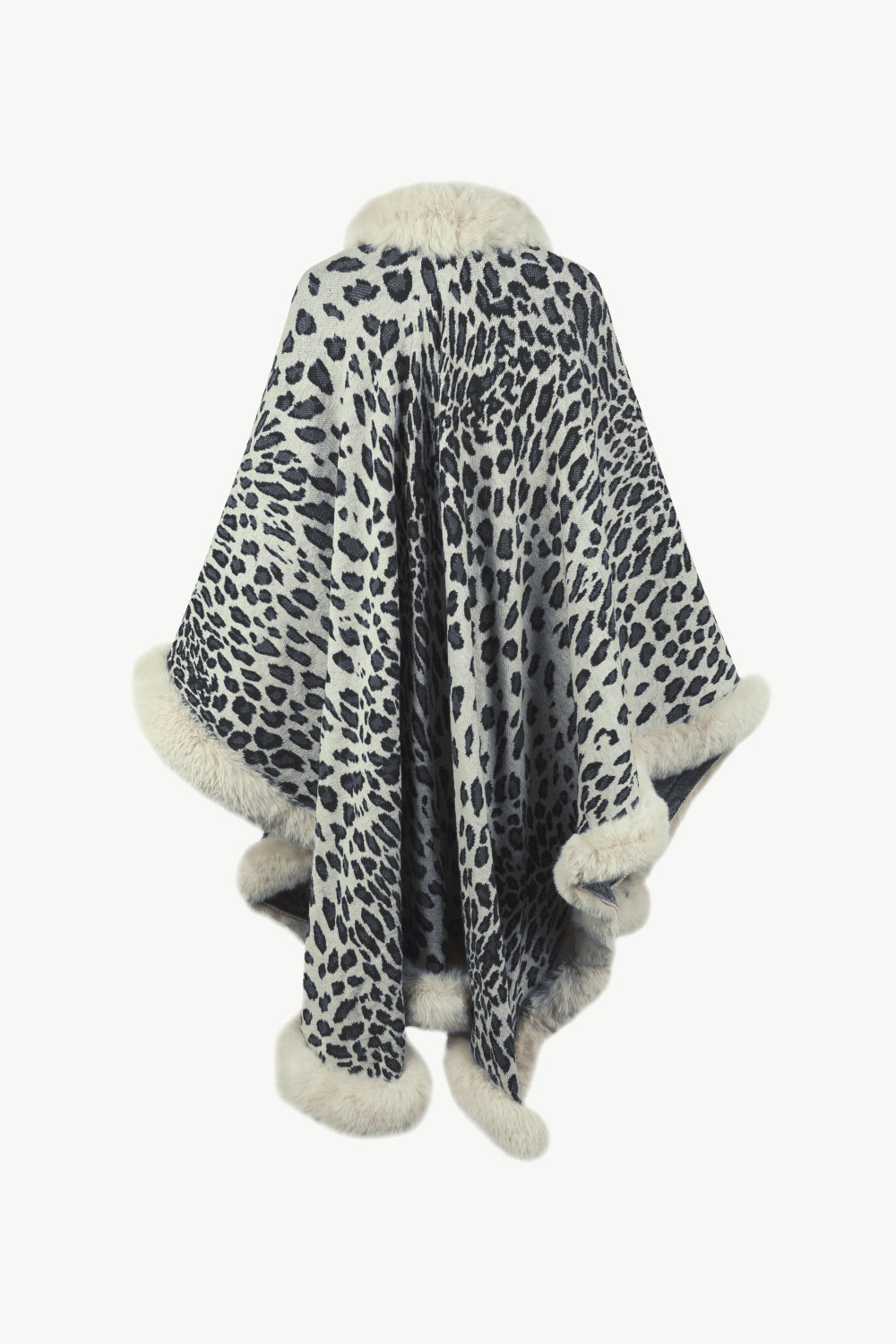 Leopard print cape with faux fur trim and collar in beige and black acrylic.