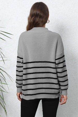 Gray ribbed knit quarter-zip sweater with black horizontal stripes.