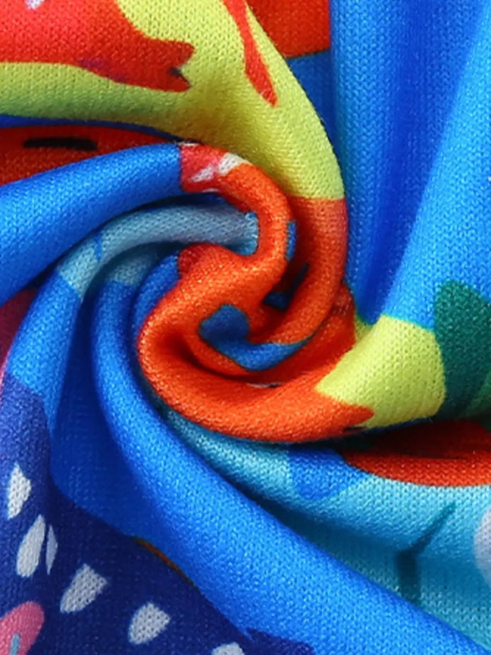 Toddler dress with a vibrant ocean theme, featuring a colorful coral and blue pattern.