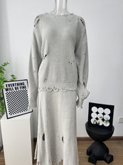 Light gray distressed cotton knit sweater and midi skirt outfit set with deconstructed details.