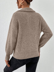 Taupe ribbed collar zip-up knit sweater with balloon sleeves.