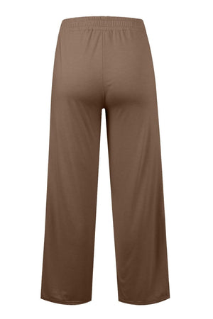 Seamed palazzo lounge trousers in tan with wide legs and elastic waistband.