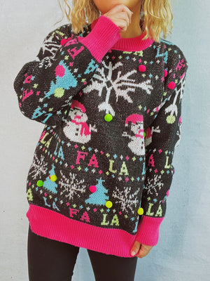 Black knit sweater with snowmen, snowflakes, trees, and pom-pom details.