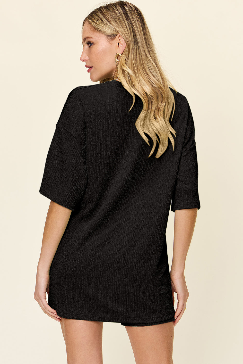Black textured boxy tee and shorts co-ord set with short sleeves.