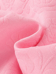 Pink baby hoodie set with embossed floral pattern, soft knit fabric detail