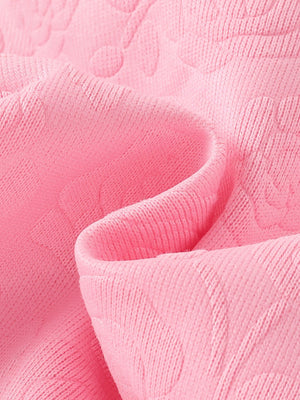 Pink baby hoodie set with embossed floral pattern, soft knit fabric detail