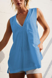 Blue oversized V-neck tank top with a pocket and a relaxed fit.