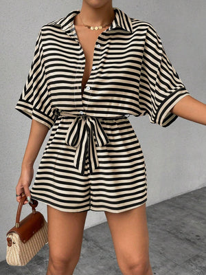 Black and white striped shirt romper with self-tie belt and button front.