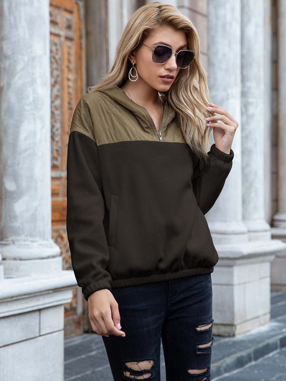 Quilted shoulder block fleece hoodie in khaki and dark blue with a quarter zip and pockets.