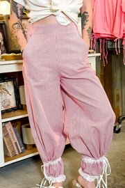 Lace-trimmed stripe wide-leg maternity pants with drawstring ankles.