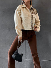 Beige panelled plaid and faux leather jacket with button details and pockets.