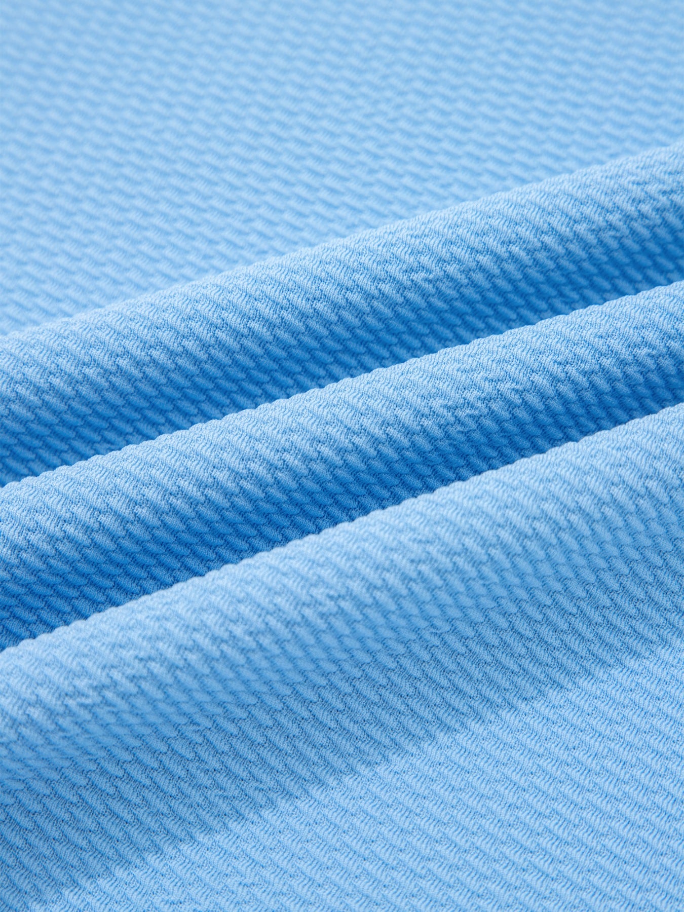 Textured blue bubble sleeve blouse fabric detail
