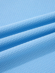 Textured blue bubble sleeve blouse fabric detail