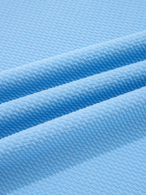 Textured blue bubble sleeve blouse fabric detail