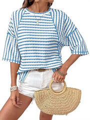 Light blue and white wavy stripe knit t-shirt with relaxed fit and short sleeves.