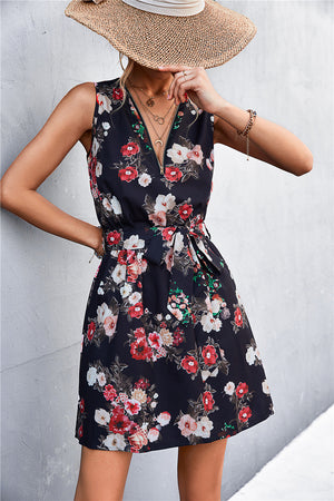 Black floral mini dress with zip-front and tie waist