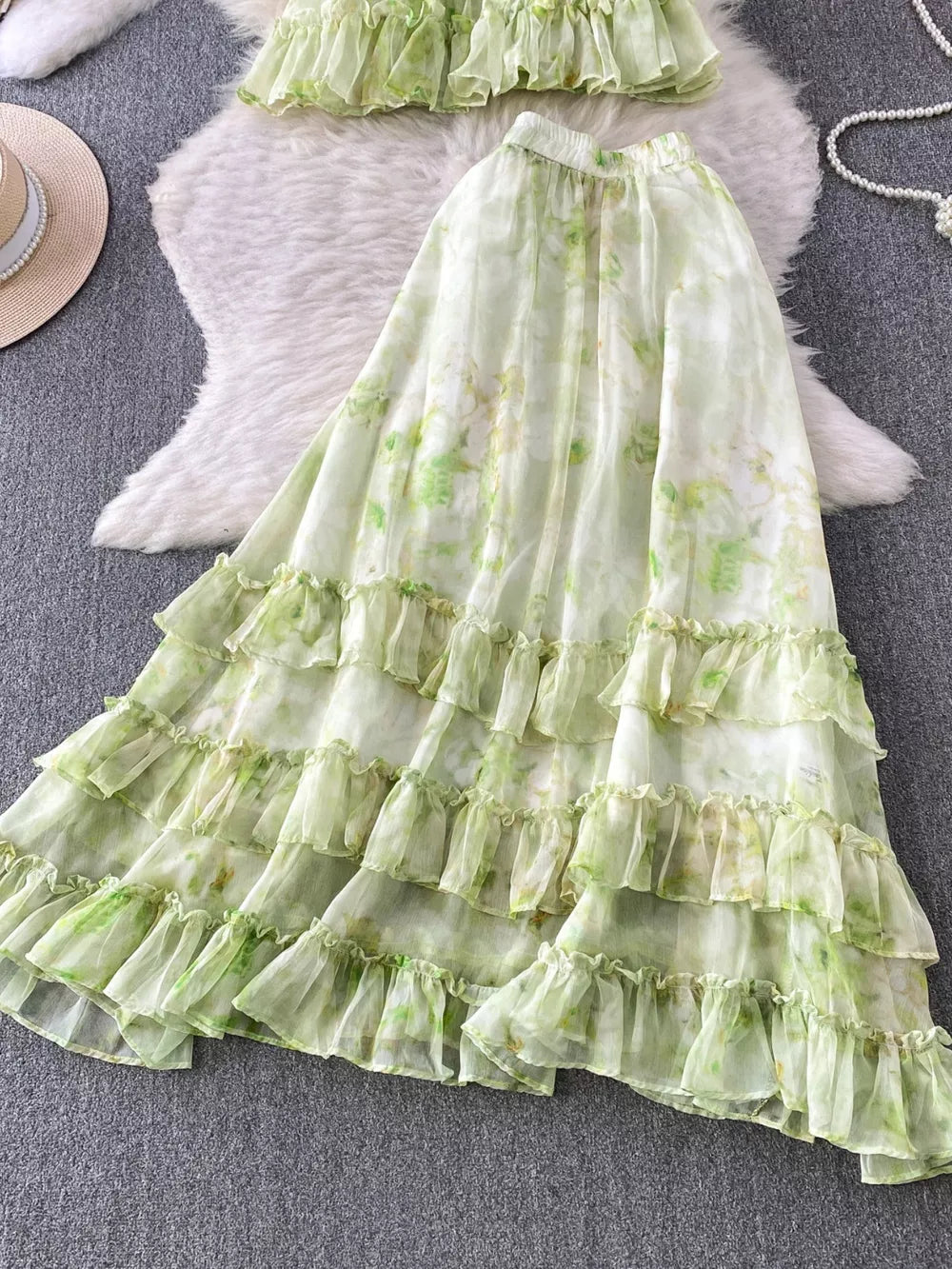 Light Green floral ruffle bikini skirt with tiered ruffles and bow detail.