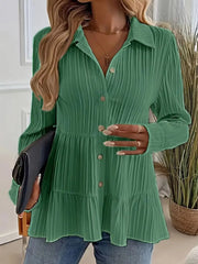 Green crinkled button-down shirt with tiered hem and long sleeves.