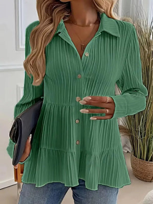 Green crinkled button-down shirt with tiered hem and long sleeves.