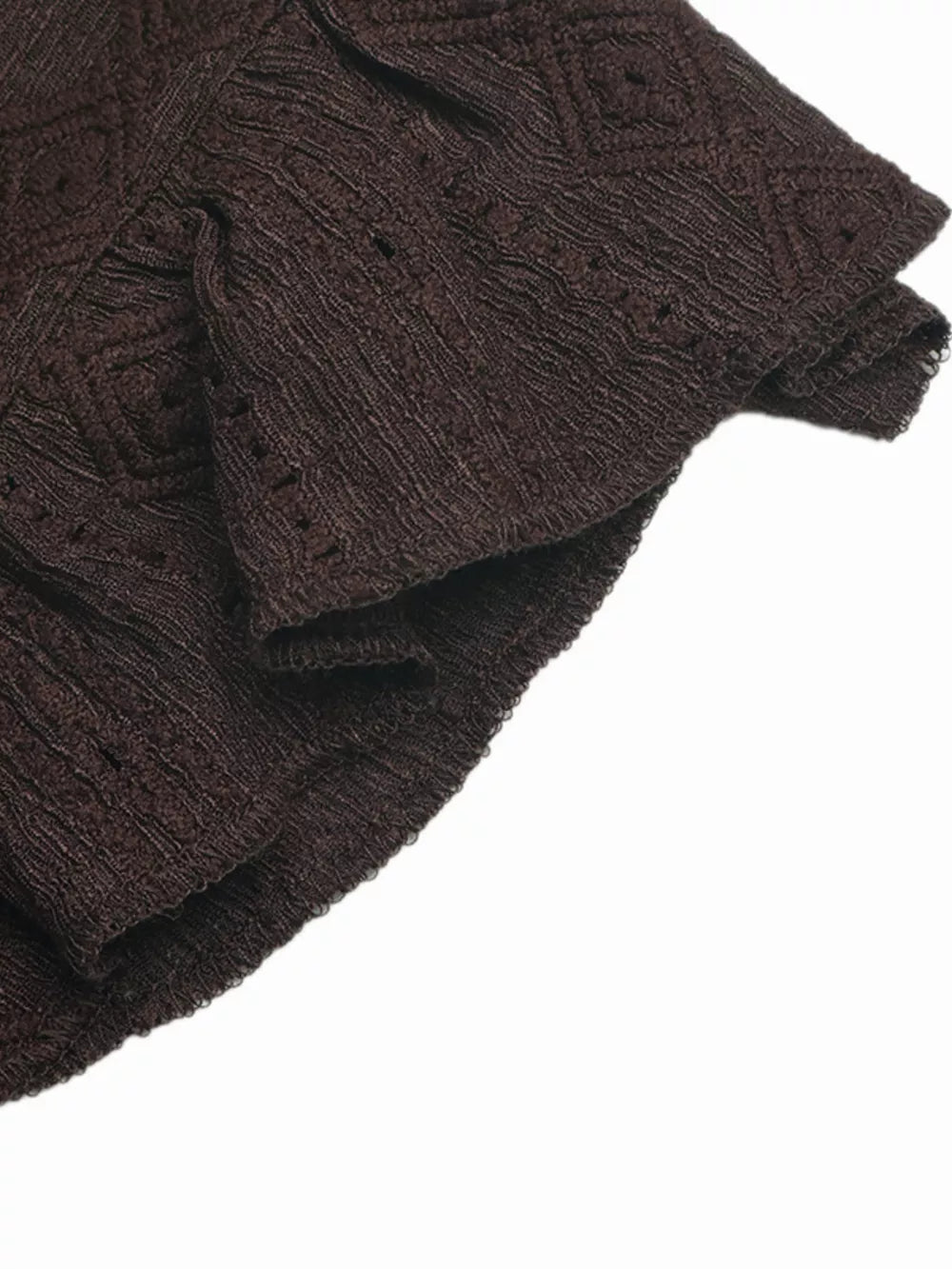 Brown lace-trimmed ruffled V-neck maternity shirt with textured fabric and diamond pattern detail.