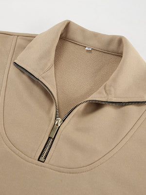 Camel quarter zip top with a gold zipper detail and collared neckline.