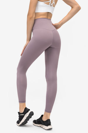 Pink Purple high-waisted leggings with V-seam detail and pockets