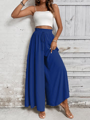Royal blue palazzo trousers with ruffled waistline and drawstring detail.
