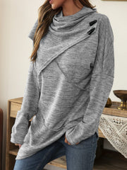 Gray knit asymmetric top with cowl neck and diagonal button detail