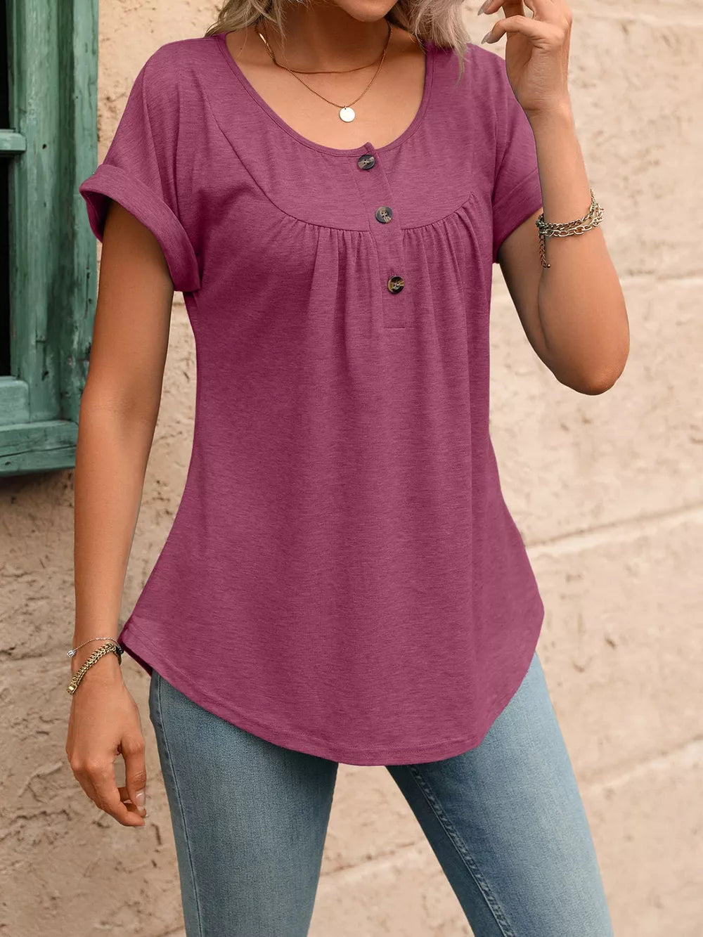 Burgundy relaxed henley t-shirt with button detail and cuffed short sleeves.