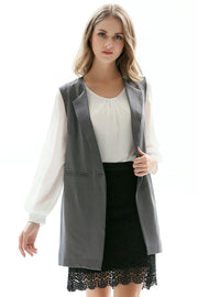Mid gray tailored sleeveless vest with single button closure and notched lapels.