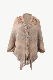 Textured stripe fringe cape in tan with pink and gray accents, acrylic knit.
