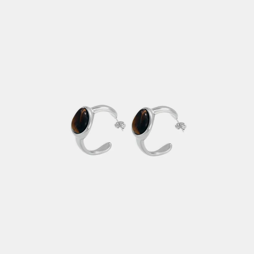 Silver hoop earrings with oval tiger's eye stones
