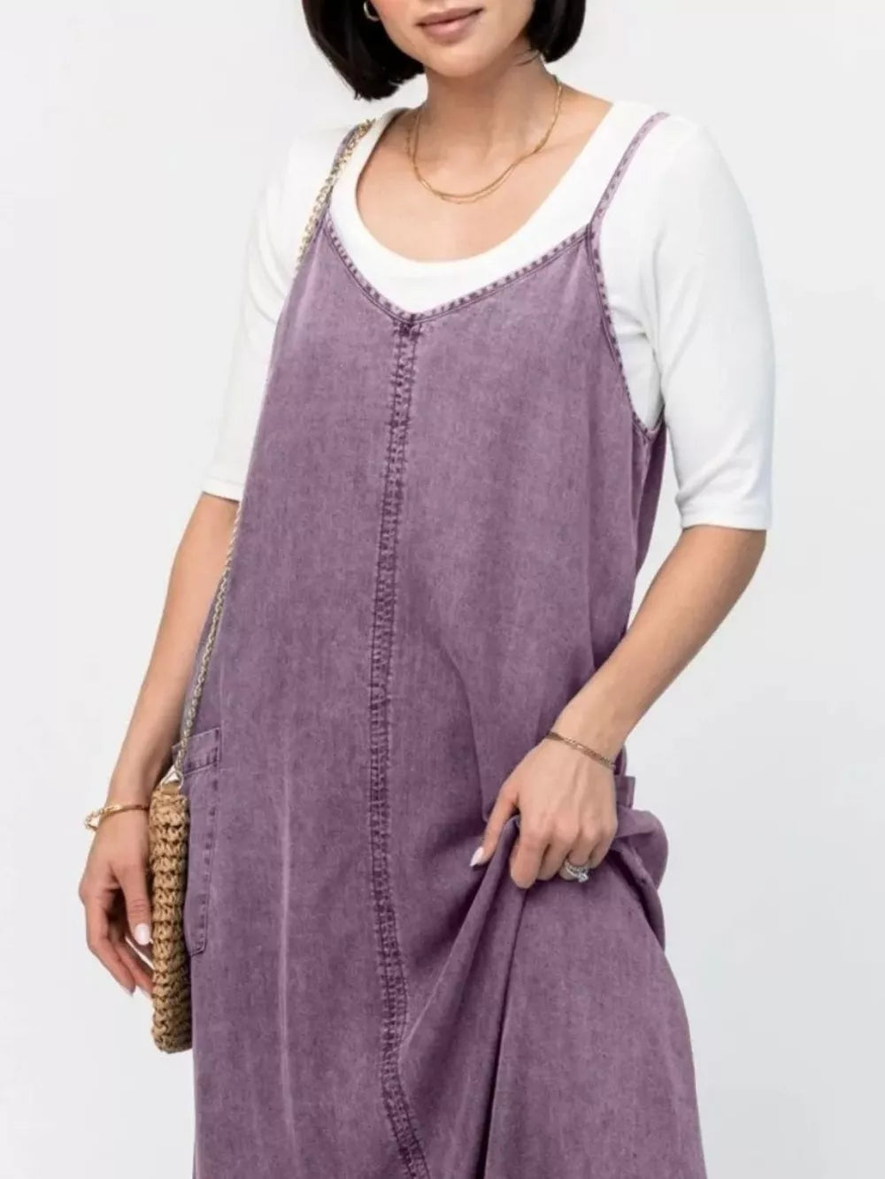 Gray Purple denim maxi dress with V-neck and adjustable straps, styled with a white tee.