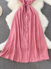 Pink polka dot maxi dress with button front and tie waist.