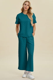 Textured knit loungewear set in cerulean, featuring a crewneck tee and wide-leg pants with drawstring waist.