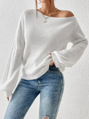 White off-shoulder ribbed knit top with balloon sleeves styled with jeans