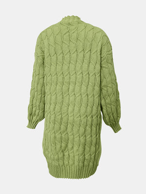 Green cable knit duster cardigan with textured diamond pattern and mock neck.
