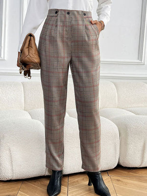 High-waisted taupe plaid trousers with pleat detail and button closure.