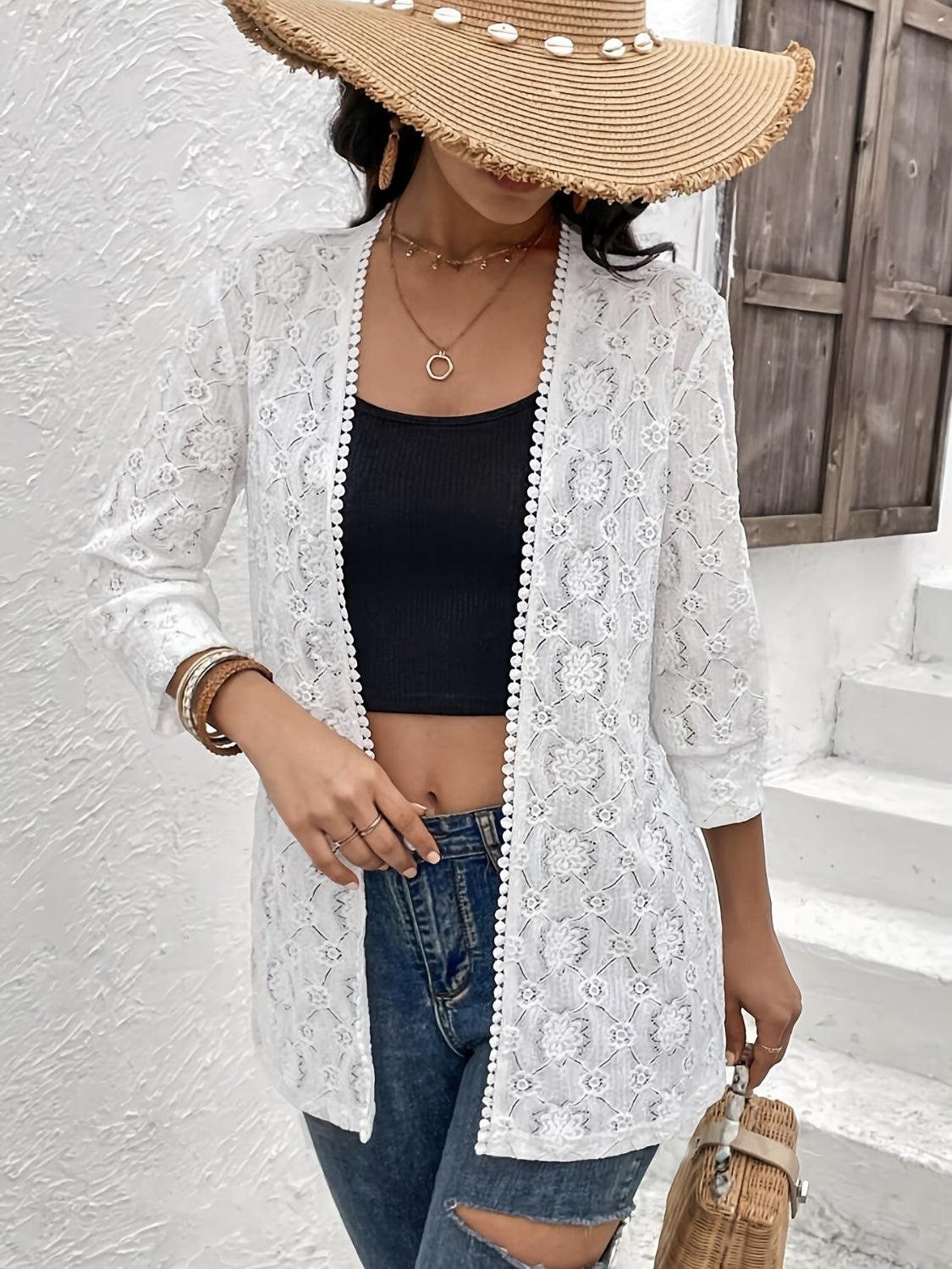 White floral lace open-front duster with beaded trim and 3/4 sleeves.
