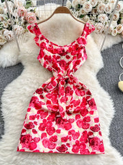 Charming floral ruffle trim mini dress with bow detail and scoop neck.