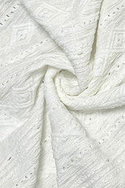 White textured diamond-stitch blouse with button-down style