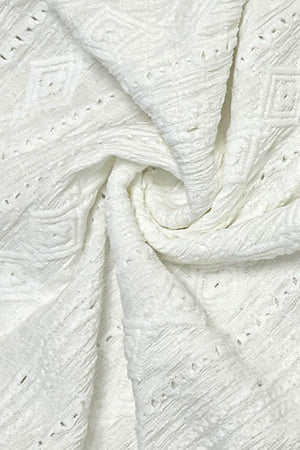 White textured diamond-stitch blouse with button-down style