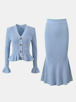 Light blue knit cardigan with ruffled hem and bell sleeves, paired with a matching mermaid skirt.