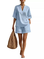 Sky blue notched V-neck half sleeve loungewear top with matching shorts.
