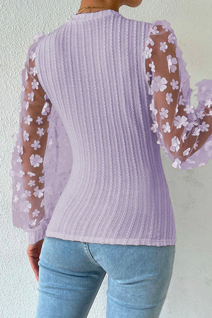 Lavender knit blouse with sheer floral appliqué sleeves