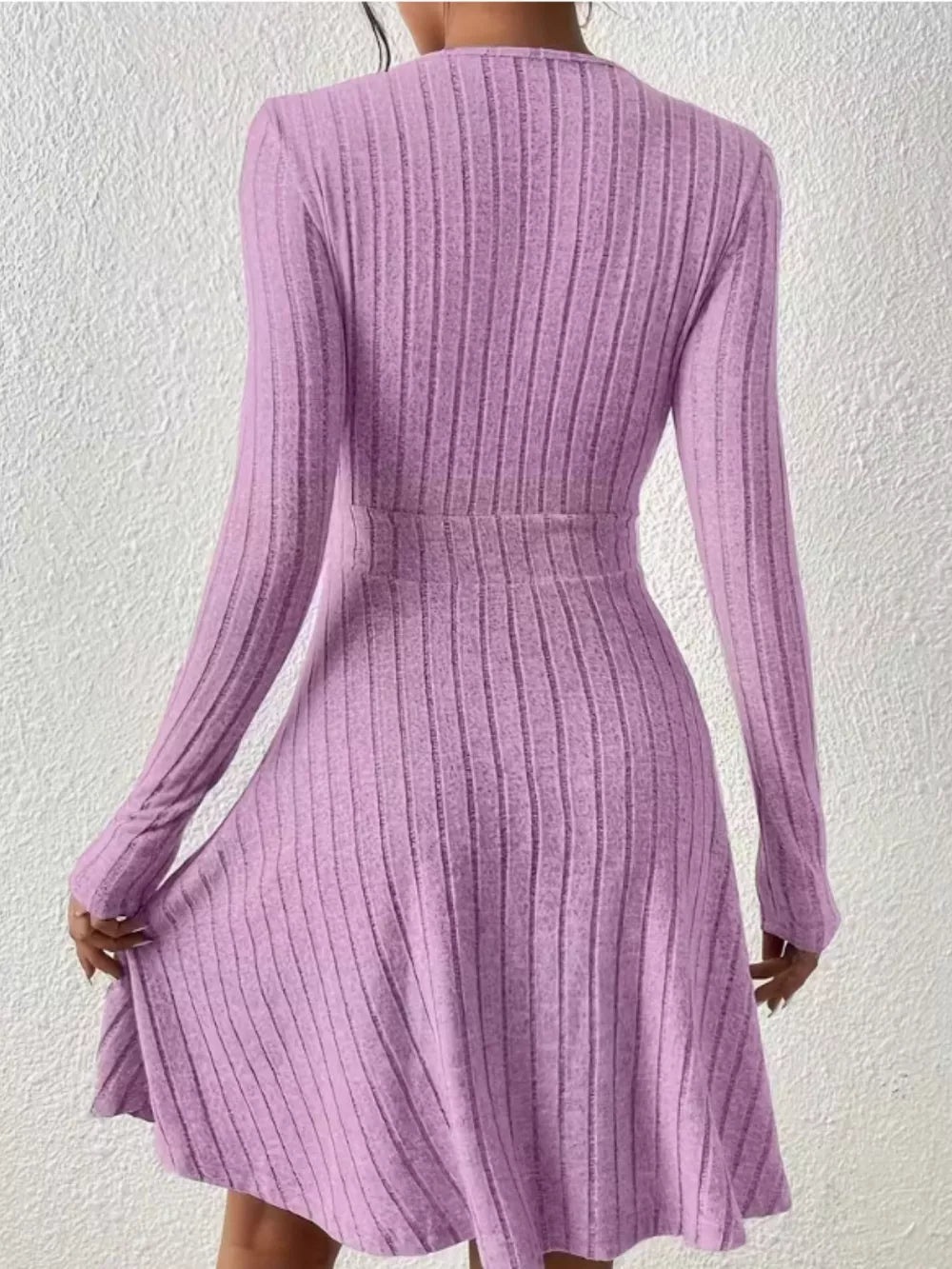 Lavender ribbed wrap mini dress with long sleeves and A-line skirt.