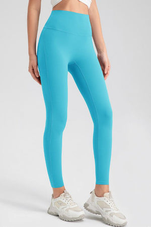 Light Blue high-waist performance leggings with sculpting seams.