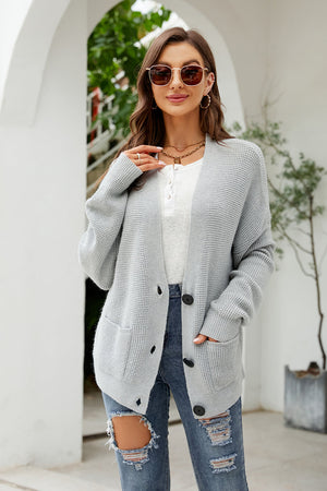 Cloudy Blue waffle knit oversized button-front cardigan with pockets.