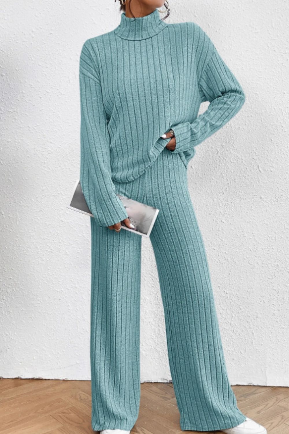 Ribbed knit turtleneck lounge set in aqua with wide leg pants.
